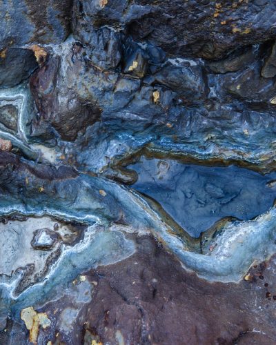 A top view of wet rocks in Rio Tinto mining park