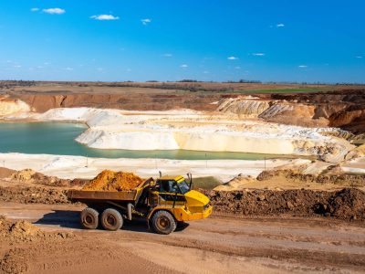 Big truck works at quartz sand quarry
