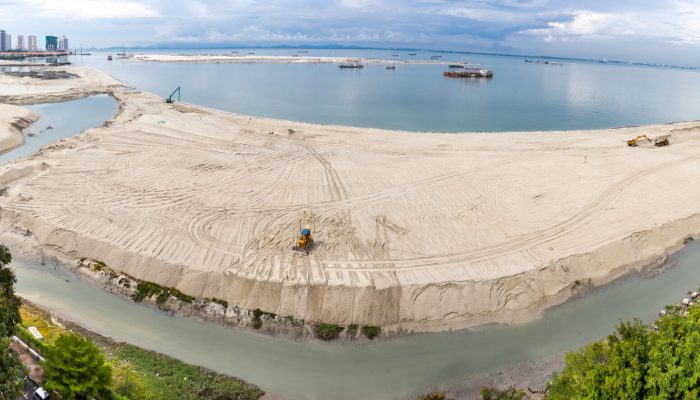 Aerial panoramic view of Penang's Gurney Drive sea reclamation